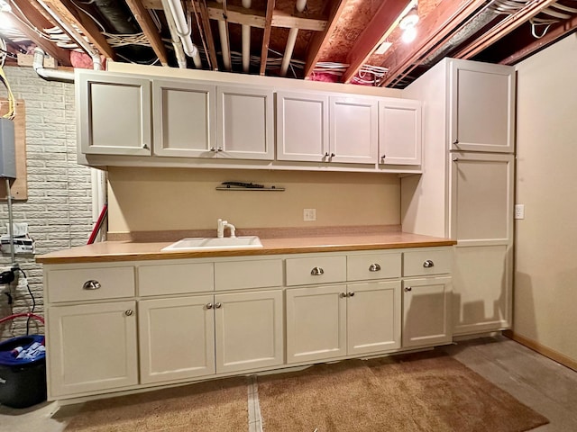 1201 Morningside Cir, Marshall, MN 56258 - kitchen with light countertops and white cabinetry