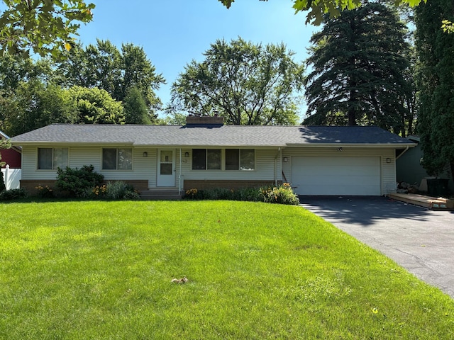 3142 Boone Ave N, New Hope, MN 55427 - single story home featuring driveway, a garage, a front lawn, a chimney, and a shingled roof