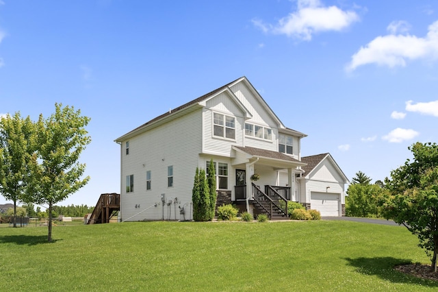 7850 242nd St, Wyoming, MN 55025 - view of front facade featuring a front lawn, stairs, and asphalt driveway