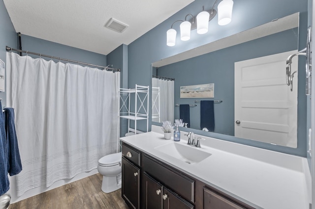 7850 242nd St, Wyoming, MN 55025 - full bath with wood finished floors, vanity, and curtained shower
