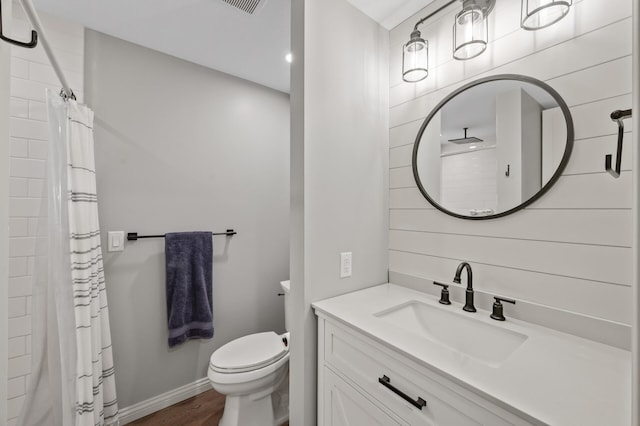 7850 242nd St, Wyoming, MN 55025 - bathroom with vanity, a shower with curtain, and wood finished floors