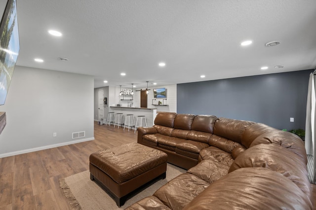 7850 242nd St, Wyoming, MN 55025 - living area with recessed lighting and light wood finished floors
