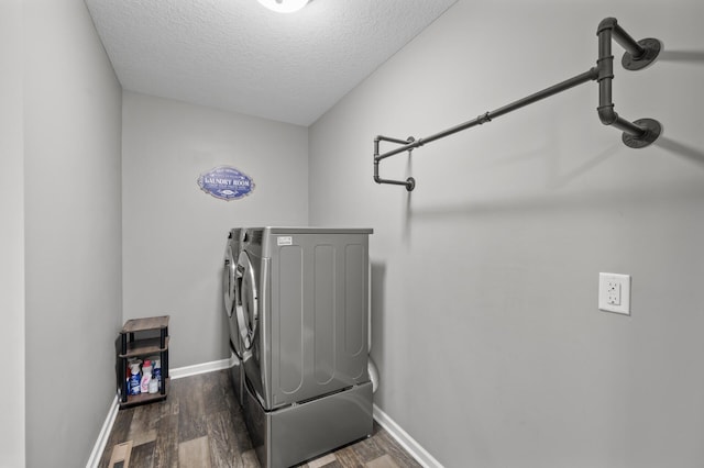 7850 242nd St, Wyoming, MN 55025 - laundry room featuring independent washer and dryer, wood finished floors, and a textured ceiling