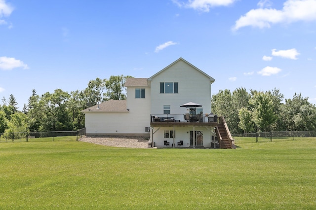 7850 242nd St, Wyoming, MN 55025 - back of property with stairway, a deck, a fenced backyard, and roof with shingles