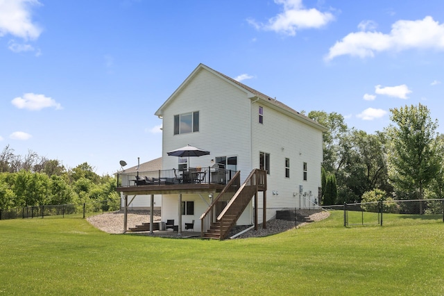 7850 242nd St, Wyoming, MN 55025 - back of property featuring stairway, a deck, and a fenced backyard