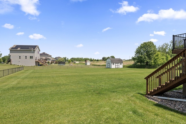 7850 242nd St, Wyoming, MN 55025 - fenced backyard with stairway and a storage shed