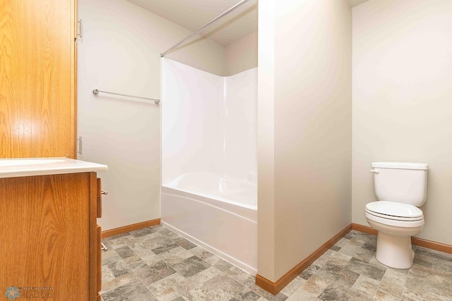 2054 12th St W, West Fargo, ND 58078 - bathroom with shower / bathtub combination, stone finish floors, and vanity