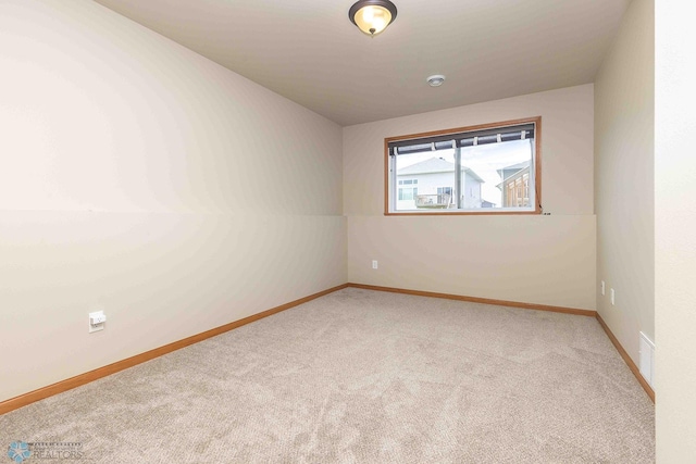2054 12th St W, West Fargo, ND 58078 - carpeted empty room with baseboards and a smoke detector