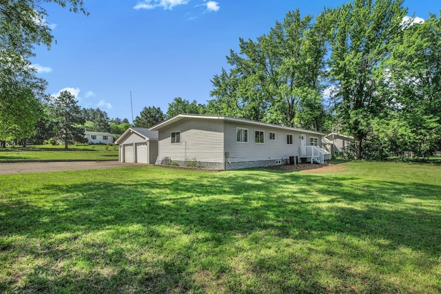 9353 Ideal Rd, Watab Twp, MN 56367 - view of front of property with a front yard and an outbuilding