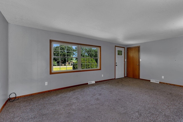 9353 Ideal Rd, Watab Twp, MN 56367 - empty room with carpet floors and a textured ceiling