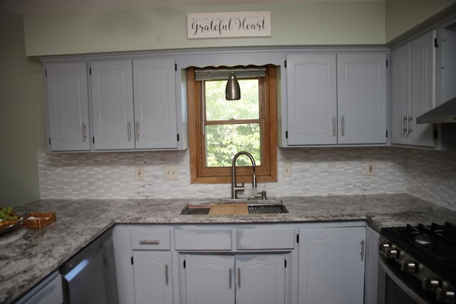 3930 99th Ave NE, Blaine, MN 55014 - kitchen featuring backsplash, stainless steel dishwasher, wall chimney exhaust hood, and light stone counters