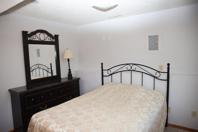 3930 99th Ave NE, Blaine, MN 55014 - bedroom with electric panel and a textured ceiling