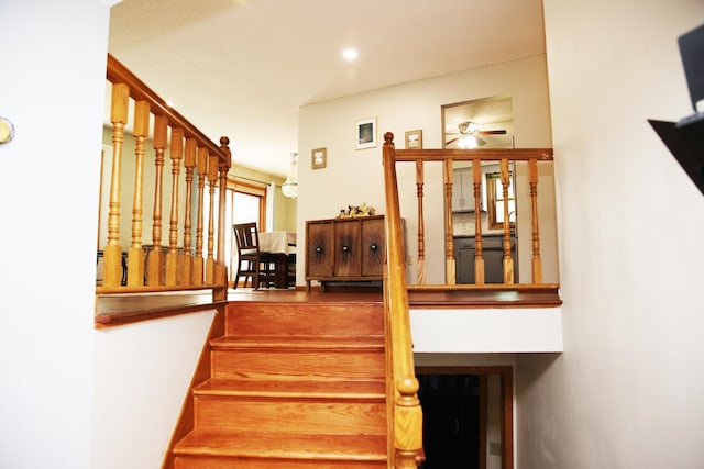 3930 99th Ave NE, Blaine, MN 55014 - stairs with ceiling fan and recessed lighting