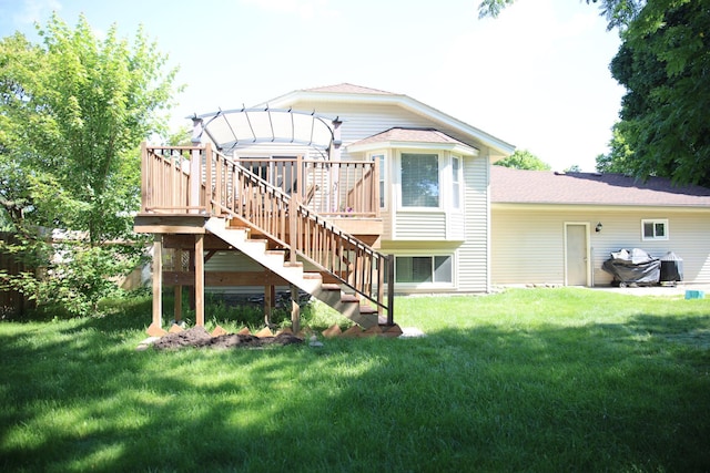 3930 99th Ave NE, Blaine, MN 55014 - back of property featuring stairway, a wooden deck, a yard, and roof with shingles
