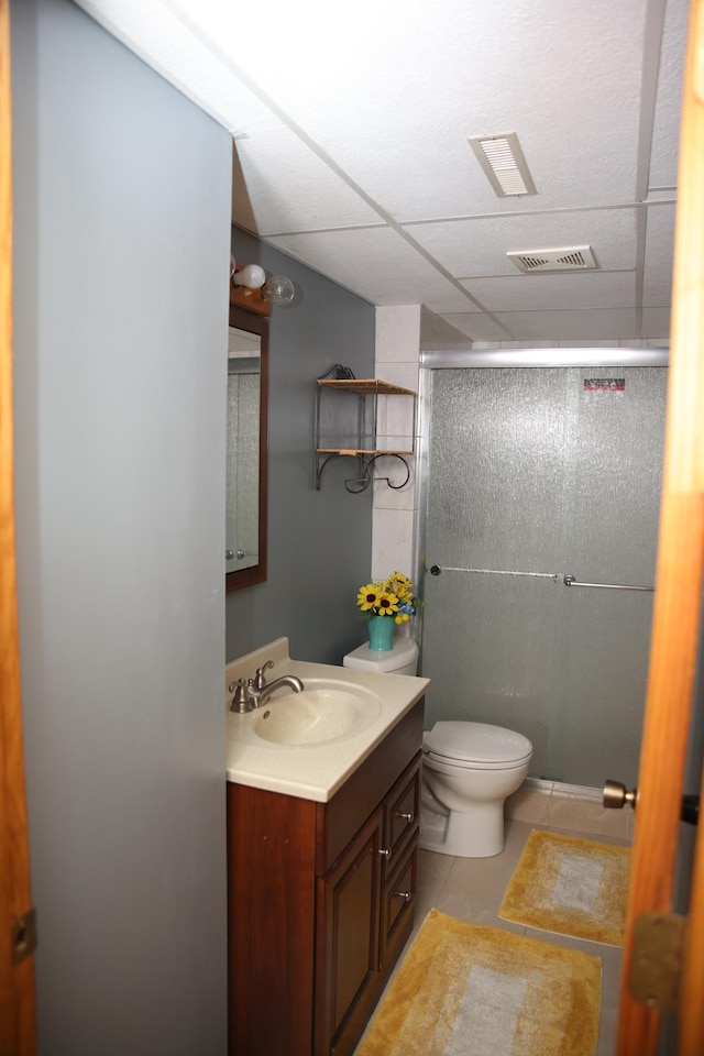 3930 99th Ave NE, Blaine, MN 55014 - full bath featuring vanity, a shower stall, tile patterned floors, and a paneled ceiling