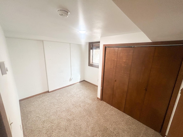 428 16th St, Windom, MN 56101 - unfurnished bedroom featuring carpet flooring and a closet
