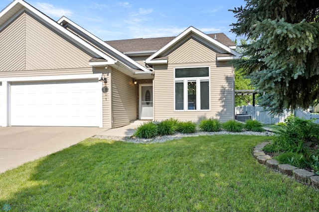 3501 19th St S, Fargo, ND 58104 - view of front of house featuring an attached garage, driveway, and roof with shingles
