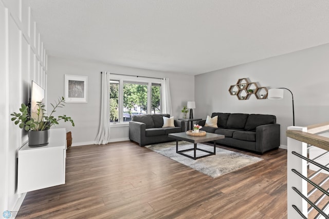 3501 19th St S, Fargo, ND 58104 - living room featuring dark wood-style floors and baseboards