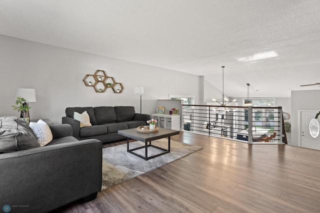 3501 19th St S, Fargo, ND 58104 - living area featuring a chandelier and wood finished floors