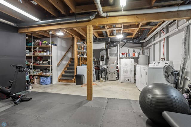 3501 19th St S, Fargo, ND 58104 - unfinished below grade area with gas water heater, washing machine and dryer, and stairs