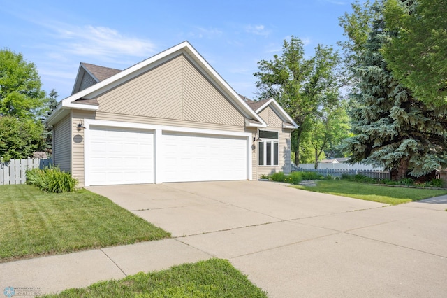 3501 19th St S, Fargo, ND 58104 - view of front facade featuring concrete driveway and an attached garage