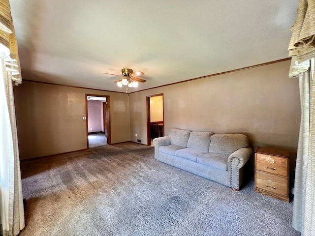 290 5th Ave, Granite Falls, MN 56241 - unfurnished living room featuring carpet, ceiling fan, and crown molding