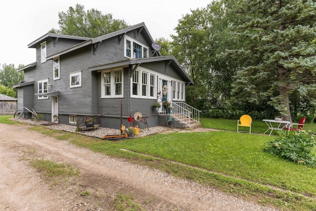 27960 County Highway 88, Carlisle Twp, MN 56537 - view of home's exterior with a lawn and entry steps