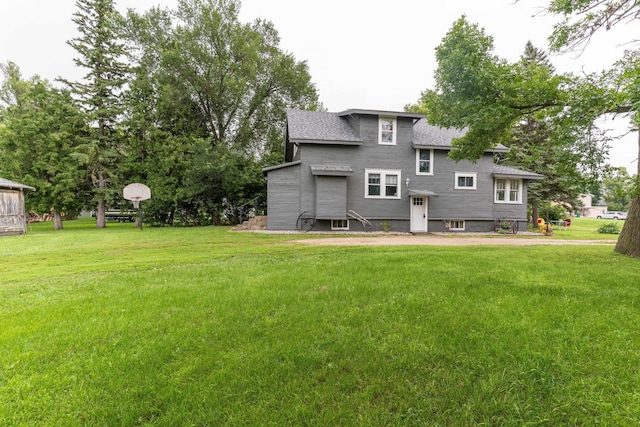 27960 County Highway 88, Carlisle Twp, MN 56537 - rear view of house featuring a yard and a shingled roof