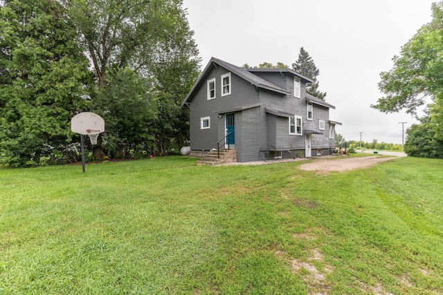 27960 County Highway 88, Carlisle Twp, MN 56537 - back of property featuring a lawn and entry steps