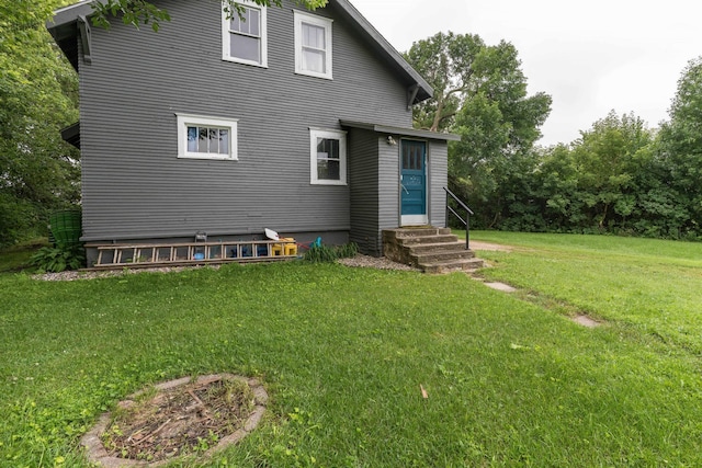 27960 County Highway 88, Carlisle Twp, MN 56537 - back of property with entry steps and a yard
