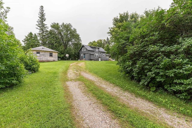 27960 County Highway 88, Carlisle Twp, MN 56537 - view of grassy yard featuring dirt driveway