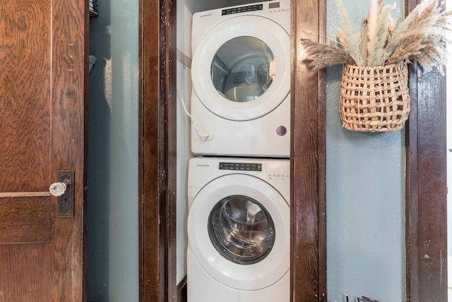 27960 County Highway 88, Carlisle Twp, MN 56537 - laundry area featuring stacked washing machine and dryer