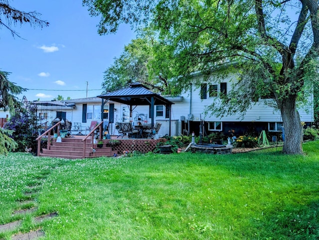 18467 County Road 21, Glenwood Twp, MN 56334 - back of property with a gazebo, a yard, and a wooden deck