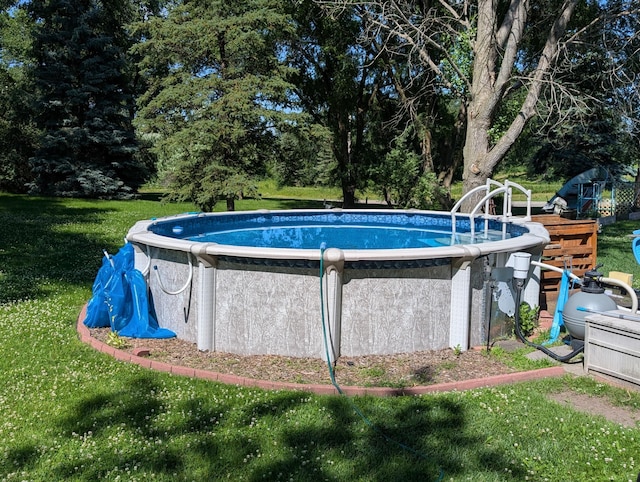 18467 County Road 21, Glenwood Twp, MN 56334 - outdoor pool with a yard
