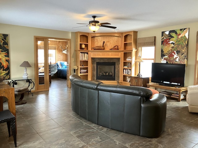 2040 Summit Dr, Cushing, MN 56443 - living area featuring ceiling fan and a fireplace