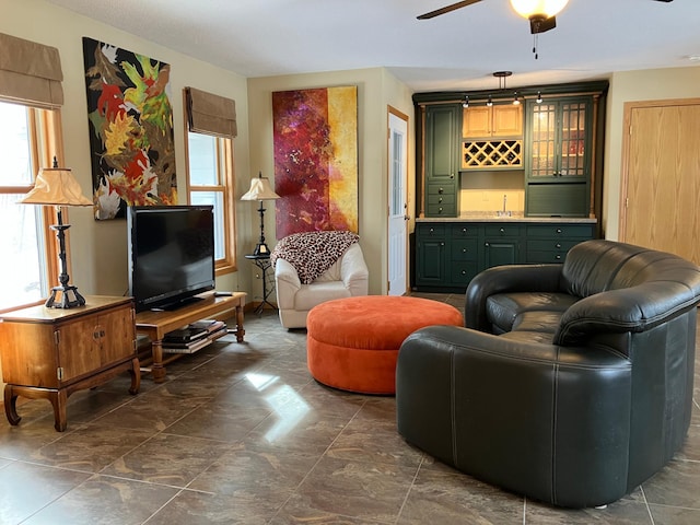 2040 Summit Dr, Cushing, MN 56443 - living room featuring wet bar and ceiling fan