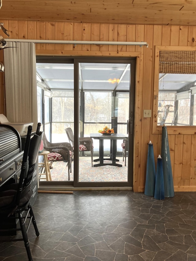 2040 Summit Dr, Cushing, MN 56443 - doorway featuring stone floors and wooden walls