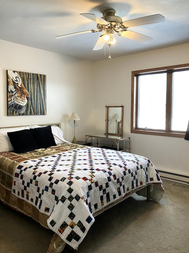 2040 Summit Dr, Cushing, MN 56443 - carpeted bedroom featuring a baseboard radiator and a ceiling fan