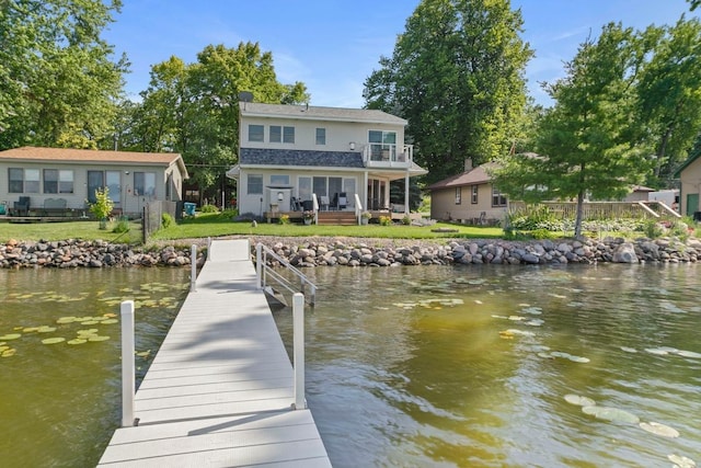 4936 210th St N, Forest Lake, MN 55025 - dock area with a balcony, a water view, and a yard