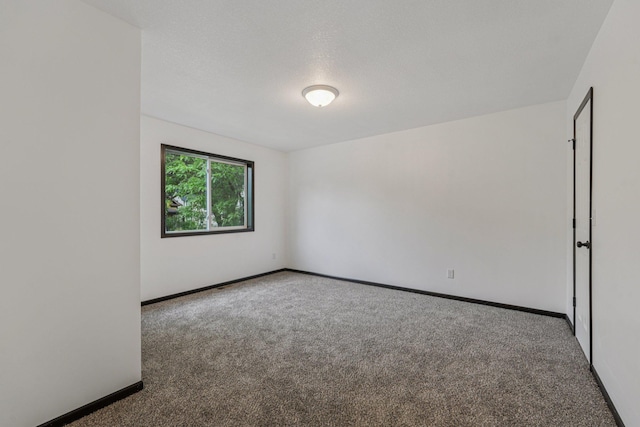 1002 Conway St, Saint Paul, MN 55106 - unfurnished room with carpet floors and baseboards