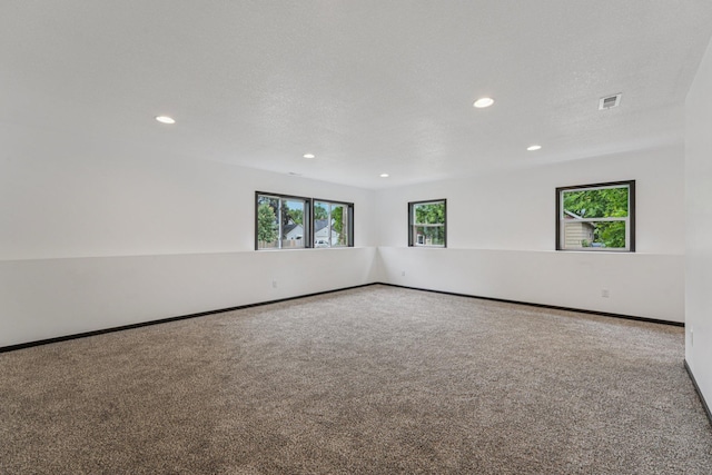 1002 Conway St, Saint Paul, MN 55106 - spare room featuring carpet flooring and recessed lighting