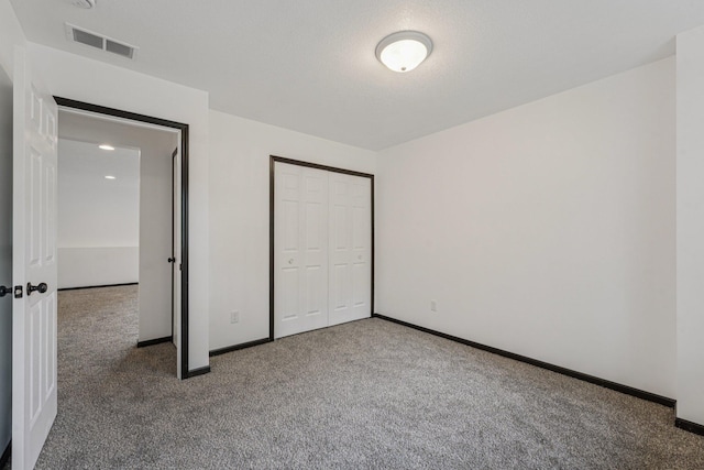 1002 Conway St, Saint Paul, MN 55106 - unfurnished bedroom with carpet floors and a closet