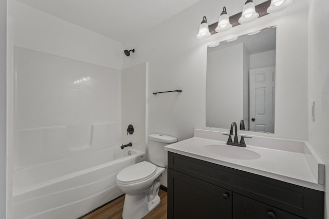 1002 Conway St, Saint Paul, MN 55106 - full bath with wood finished floors, vanity, and tub / shower combination