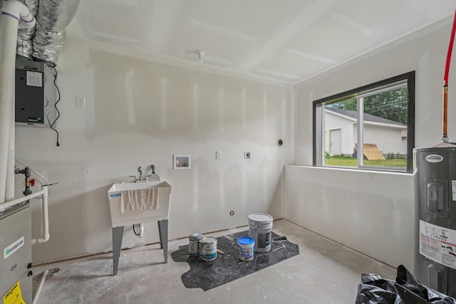 1002 Conway St, Saint Paul, MN 55106 - laundry room featuring hookup for an electric dryer, hookup for a washing machine, and electric water heater
