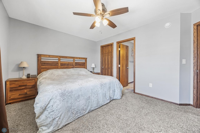 4822 34th Ave S, Fargo, ND 58104 - carpeted bedroom featuring baseboards and ceiling fan