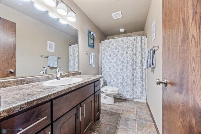 4822 34th Ave S, Fargo, ND 58104 - full bathroom with vanity and stone finish flooring