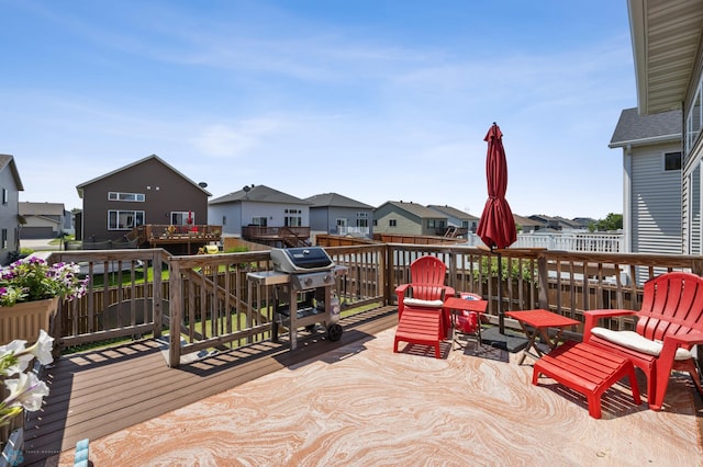 4822 34th Ave S, Fargo, ND 58104 - wooden deck featuring a residential view and area for grilling