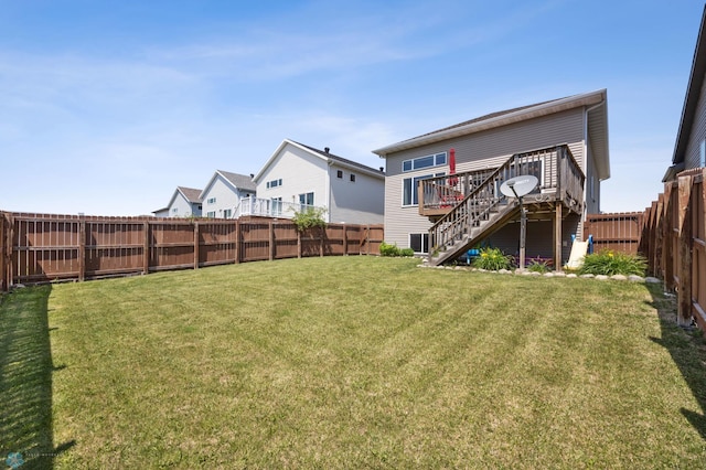 4822 34th Ave S, Fargo, ND 58104 - rear view of house with stairway, a fenced backyard, and a wooden deck