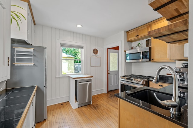 3841 Columbus Ave, Minneapolis, MN 55407 - kitchen with stainless steel appliances, light wood-type flooring, and recessed lighting
