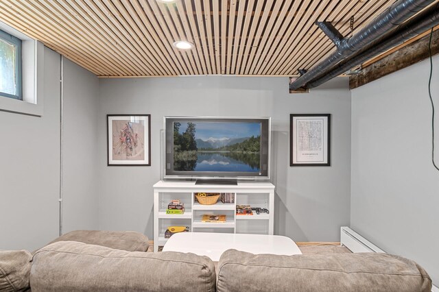3841 Columbus Ave, Minneapolis, MN 55407 - living area with a baseboard radiator, wooden ceiling, and recessed lighting